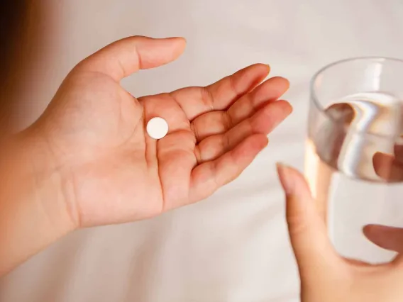 Hand with pill