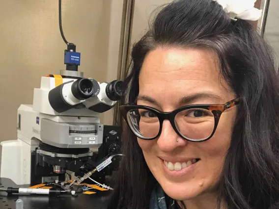 Beth Wiese smiling for photo in lab