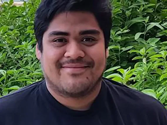 Oscar Mendez smiling for photo