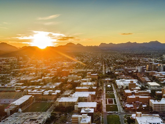 Sun setting over Tucson and UArizona campus