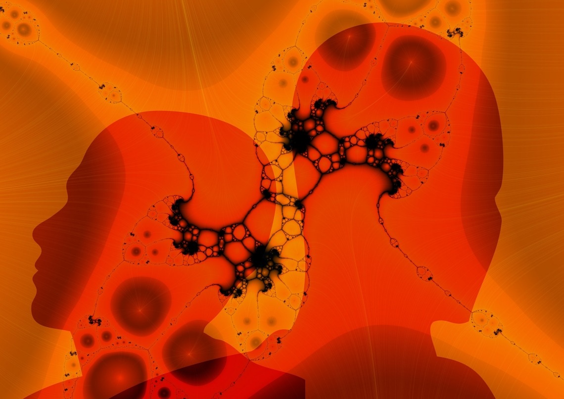 Abstract illustration of human sillhouettes and brain cells