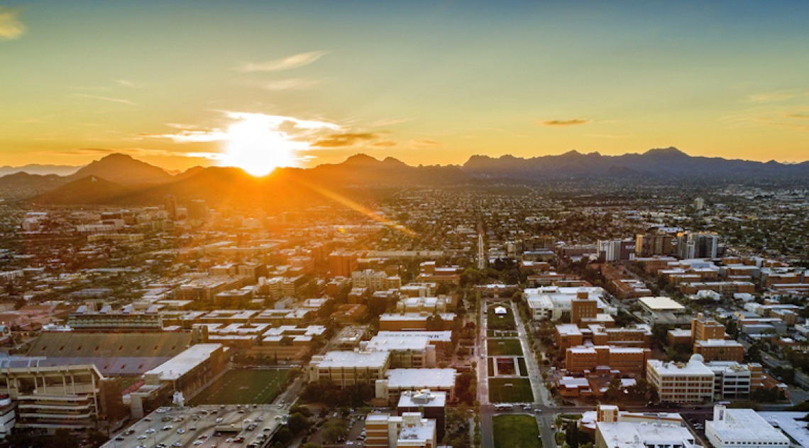 Sun setting over Tucson and UArizona campus